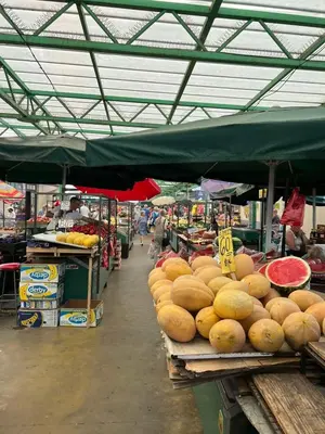 a market with a bunch of fruits and vegetables at Itaka - Belgrade City Center in Belgrade