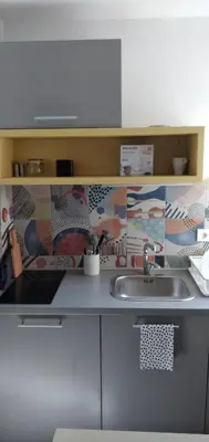a kitchen with a sink and a counter top at ADA, New Belgrade in Tošin Bunar