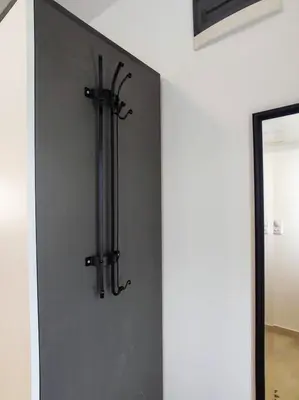 a wall with a metal object on the wall at A1 - Airport Belgrade Apartment in Belgrade