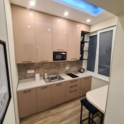 a kitchen with a sink and a microwave at Up Apartments in Belgrade