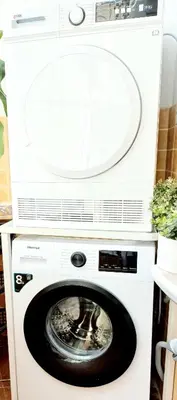 a white washer and dryer in a kitchen at GENIUS STUDIO in Belgrade