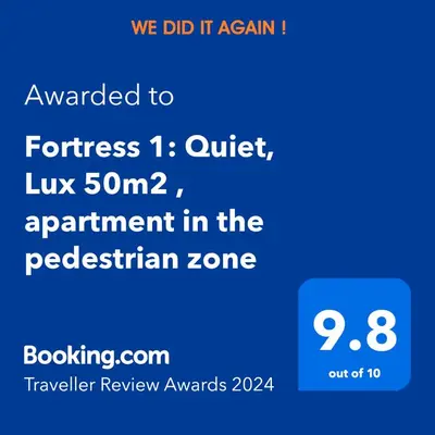 a screenshot of a phone with the text upgraded to fortress quiet lux at Fortress 1: Quiet, Lux 50m2 , apartment in the pedestrian zone in Belgrade