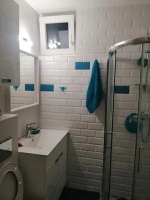 a bathroom with a sink and a shower at Caviar in Belgrade