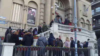 a group of people standing on the stairs of a building at Apartment Tesla Space in Belgrade