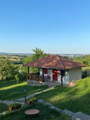 a small house on a hill with a view at Bas u inat babarogama in Koraćica
