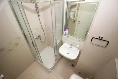 a bathroom with a shower and a sink at Apartment Delta City Tata New Belgrade in Belgrade