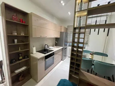 a kitchen with two chairs and a table in it at Belgrade Nest D&A in Belgrade