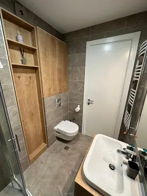 a bathroom with a toilet and a sink at Selena apartment in Belgrade