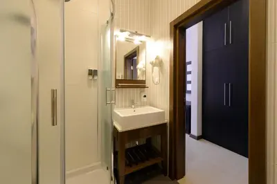 a bathroom with a sink and a mirror at Hotel Majdan in Belgrade