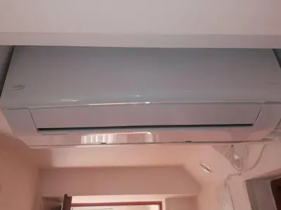a ceiling with a light in a room at Apartman Oaza Olja in Belgrade