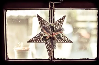 a glass window with a star decoration on it at Bukovički mir in Arandjelovac