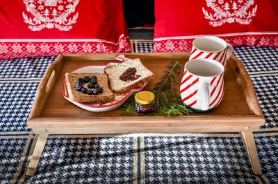 a tray with a plate of toast and a cup of coffee at Bukovički mir in Arandjelovac