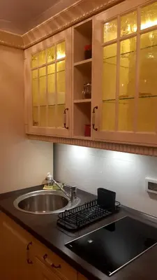 a kitchen with a sink and a counter top with a sink at Modern Lux Studio w Inside parking 5 min from Skadarlija, Republic Sqre in Belgrade