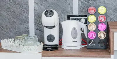 a coffee maker on a wooden shelf next to a blender at 9 Nine - Luxury Apartments & Suites in Belgrade