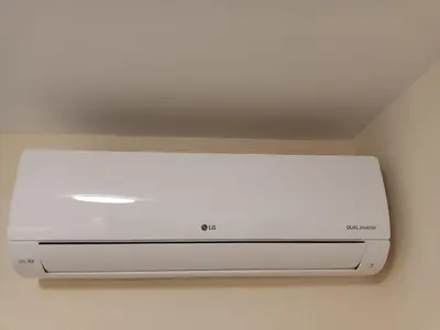 a dvd player is attached to a ceiling at Apartman Marina in Sajmište