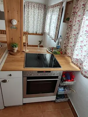 a kitchen with a stove and a sink at Sopot Paradise in Sopot