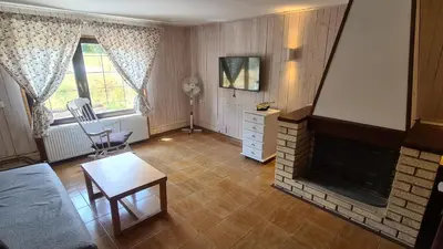 an aerial view of a living room with a fireplace at Sopot Paradise in Sopot