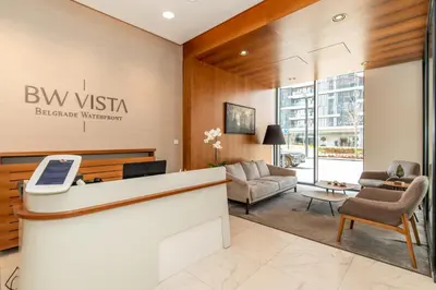 a lobby of a hotel with a reception desk at Modern Apartment in Belgrade Waterfront in Belgrade