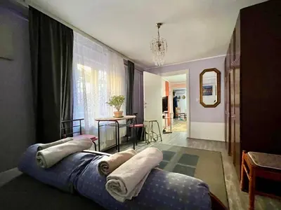 a living room with a couch with pillows on it at Verica in Vračar (historical)