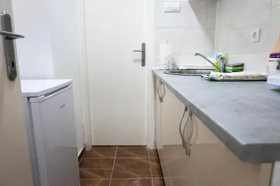 a kitchen with a sink and a counter top at Apartman Janković in Arandjelovac