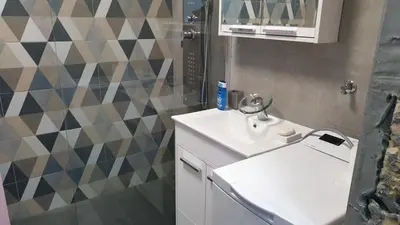 a bathroom with a white sink and a mirror at Zorz in Belgrade