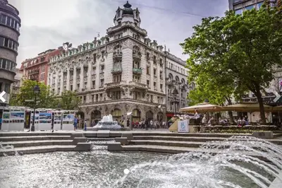 a water fountain in front of a building at Kalemegdan Central Apartment in Belgrade