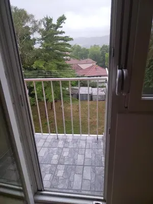 an open door with a view of a porch at Cezar in Arandjelovac