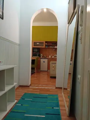 a hallway with an archway leading to a kitchen at Evergreen in Belgrade