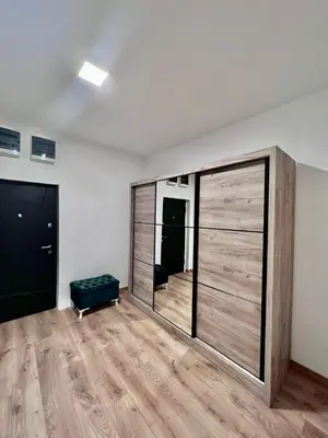 a empty room with a large sliding glass door at Hugo Bianca LUX in Belgrade