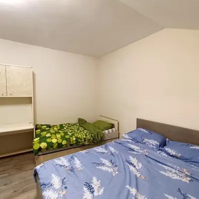 a bedroom with two beds in a room at MARIJA sa besplatnim parkingom in Novi Beograd