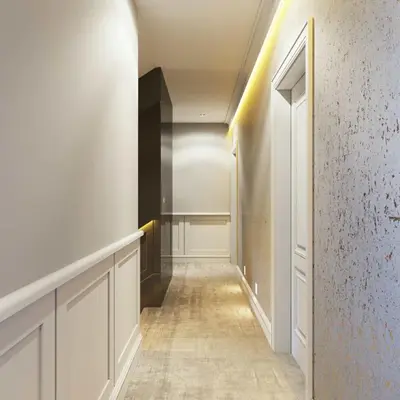 a hallway with white walls and a long hallway with white floors at H41 Luxury Suites in Belgrade