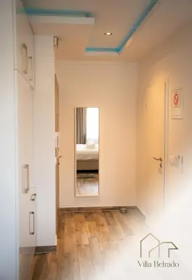 a room with a view of a bedroom at Belrado Apartments in Belgrade