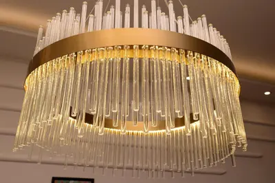 a large chandelier hanging from a ceiling at Knez Imperium in Belgrade