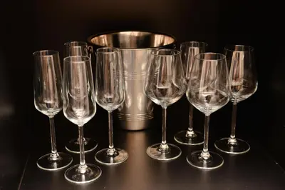a group of wine glasses in front of a bucket at Knez Imperium in Belgrade