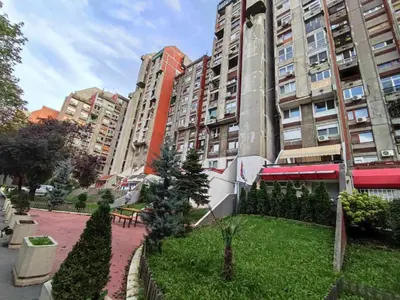 a park in front of some tall buildings at Banjica 2 in Voždovac