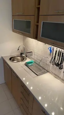 a kitchen counter top with a sink and a sink at Luka 1718 Apartments in Belgrade
