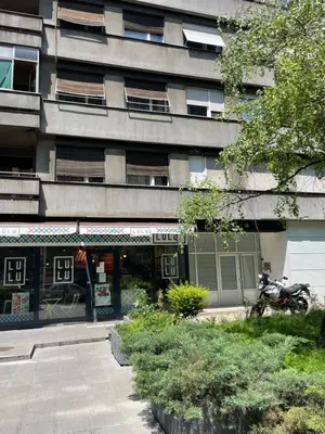 a motorcycle parked in front of a building at Alma Vracar in Belgrade
