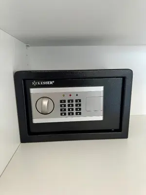 a microwave oven is attached to a wall at Vip Lounge 63 in Belgrade