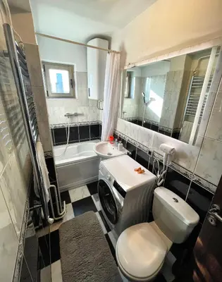 a bathroom with a toilet and a sink at Vip Lounge 63 in Belgrade