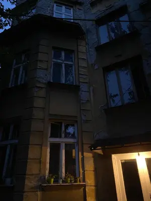 a building at night with lights in the windows at Belgrade centrum in Karaburma