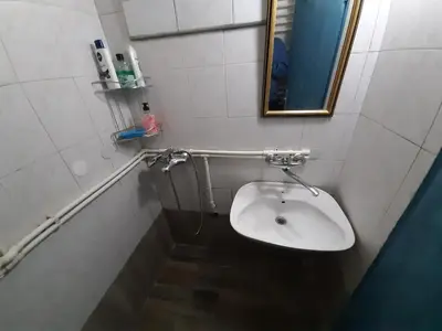 a bathroom with a sink and a mirror at Belgrade city residence, silent and comfortable in Belgrade