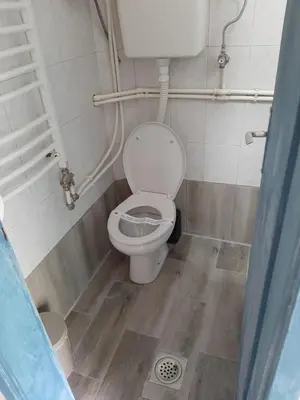 a bathroom with a white toilet in a stall at Belgrade city residence, silent and comfortable in Belgrade