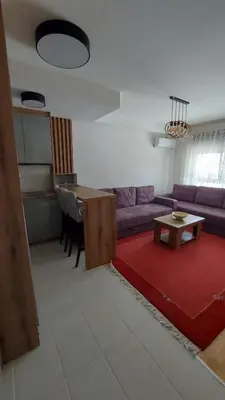 a living room with a couch and a table at Apartment Relax 1 in Belgrade
