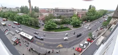 a busy city street with cars on a busy road at Apartments near city center in Belgrade
