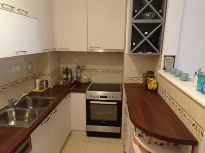 a kitchen with a sink and a stove at GO 2 Apartment in Belgrade