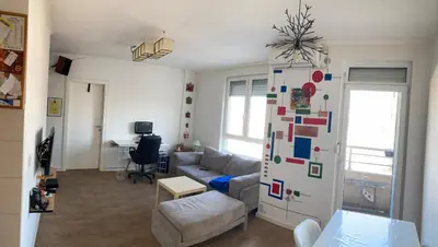 a living room with a couch and a table at Forest View in Belgrade