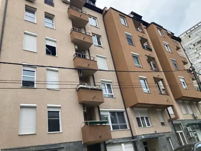 a tall building with balconies on the side of it at Forest View in Belgrade