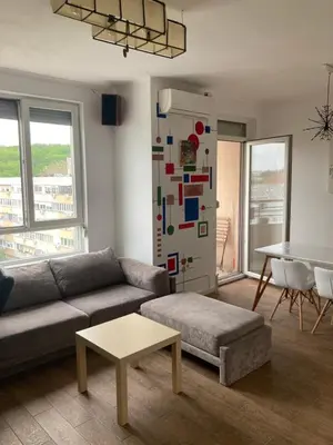 a living room with a couch and a table at Forest View in Belgrade