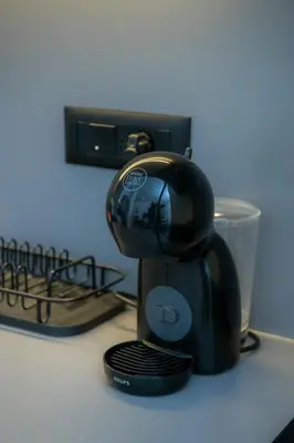 a coffee maker sitting on top of a counter at Belgrade Waterfront Metropolitan in Belgrade