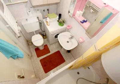 an overhead view of a bathroom with a sink and a tub at Apartment Lilian in Belgrade